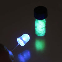 Blowout Deal! G27668 - Glass Vial of Opaque White Uranium Glass Chunks Brilliant Green Glowing