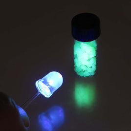 G27668 - Glass Vial of Opaque White Uranium Glass Chunks Brilliant Green Glowing