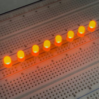 G29547 ~ (Pkg 10) Bright See-Thru Orange 5mm Lens Orange LED